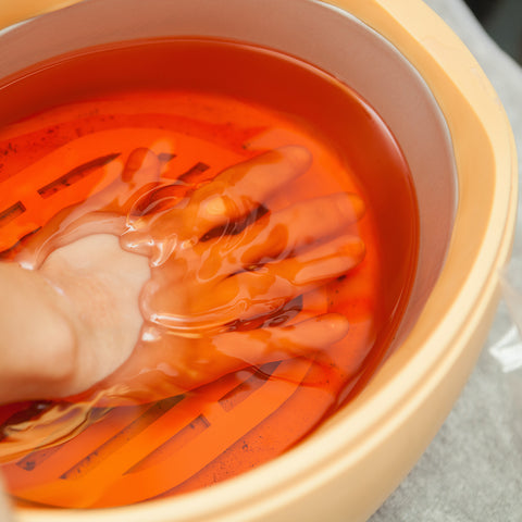Heated paraffin wax treatment